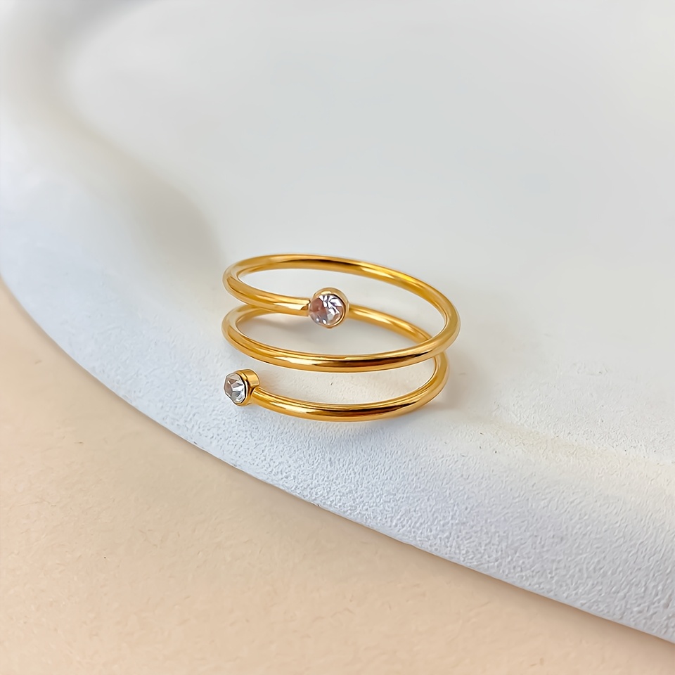 Carnival Stainless Steel Twisted Band Ring with Sparkling Artificial Stone